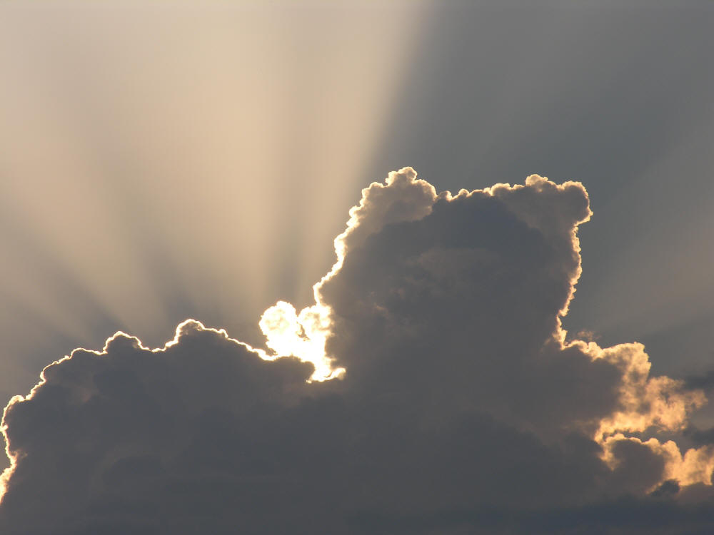Sunset with silver lining and sunbeams Etobicoke, Ontario