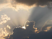 Jet contrail over cloud with silver lining at sunset Toronto, Ontario