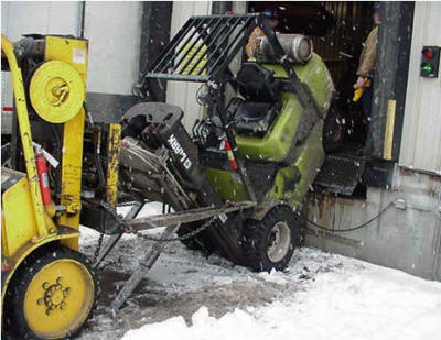 forklift crash accident snow on dock