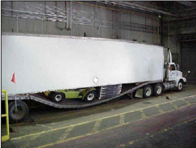 trailer damage floor collapse overloaded heavy load