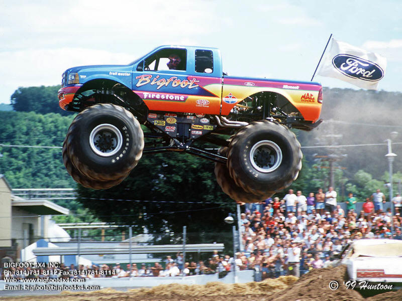 Bigfoot Monster Truck getting air jumping cars