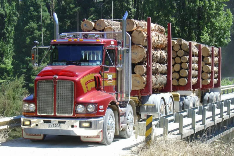 Kenworth Truck hauling logs