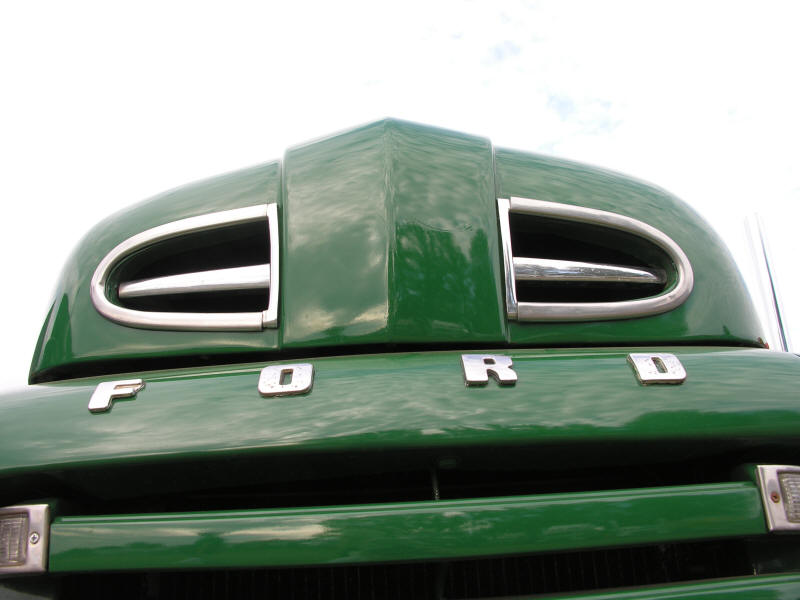 Hood of old green ford pick up truck